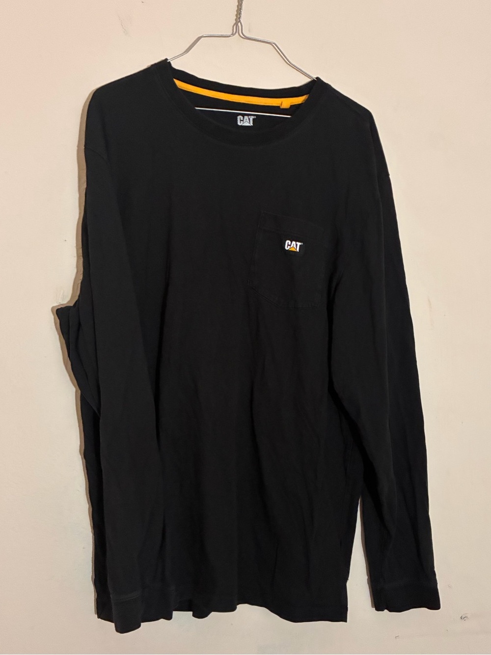 CAT Men’s Black Long Sleeve Pocket Tee with Yellow Trim